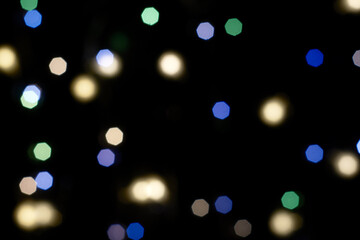 multicolored festive lights on a black background screensaver backdrop