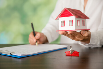 house and keys with bokeh background