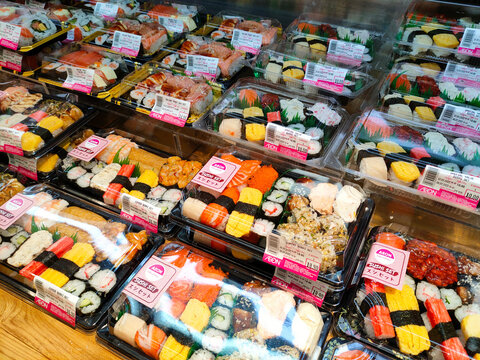 SELANGOR, MALAYSIA -MAY 2: Various types of Japanese sushi ready in packs are on display for sale. Have a price tag to make it easier for customers to buy.