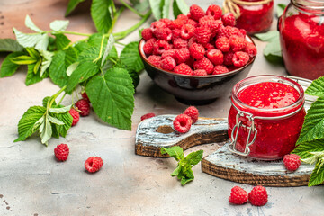 Raspberry jam with berry on light background. Homemade jam with raspberry. banner, menu, recipe place for text, top view