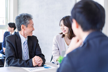 Business people meeting in a pleasant atmosphere