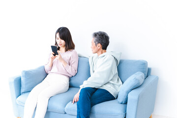 Fototapeta premium Daughter and father conversing at home