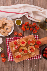 Friselle with cherry tomatoes and salt.
