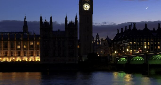 4k at 30 fps time lapse footage with tilt panning of London s clock tower that houses Big Ben and the Palace of Westminster in the dramatic twilight light of the sunset concept for British government