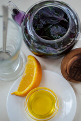 Basil tea with honey and orange.