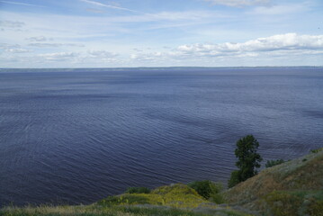 Picturesque Summer landscape with tree and herbs on the Volga River coast. Ulyanovsk