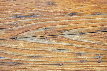 Naklejka premium Old wooden board at house in Villes-sur-Auzon, France 