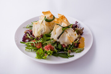 Pancakes in a bag with lamb and cheese