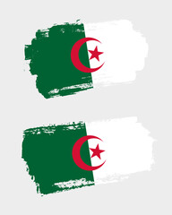 Set of two creative brush painted flags of Algeria country with solid background