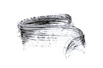 Black mascara brush strokes isolated on white.