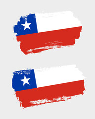 Set of two creative brush painted flags of Chile country with solid background