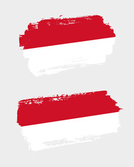 Set of two creative brush painted flags of Monaco country with solid background