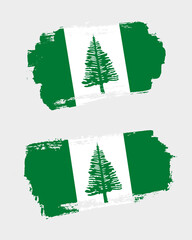 Set of two creative brush painted flags of Norfolk Island country with solid background
