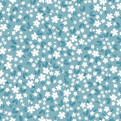 Simple vintage pattern. Small white flowers, blue leaves. light blue background. Fashionable print for textiles and wallpaper.