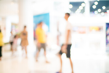 Blurred people shopping in supermarket convinience store