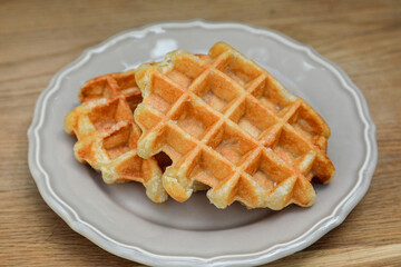 Belgian waffle with chocolate spread. Wafers. Dessert. American waffles. We made waffles at home. Breakfast. Coffee with waffles
