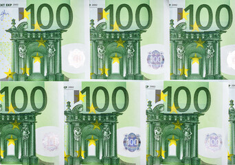 Rows of one hundred euro bills as financial background.