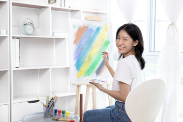 Female artist painting on canvas, Artist studio interior, Draw with watercolor, Drawing supplies ,...