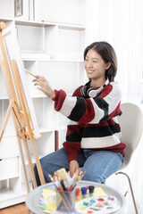 Female artist painting on canvas, Artist studio interior, Draw with watercolor, Drawing supplies , Painting and creativity, Use a brush to draw a pattern by stripes, Artwork, Using Paint Brush.