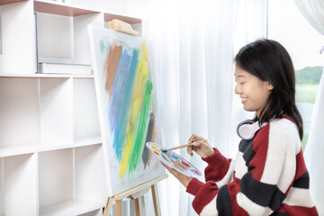 Female artist painting on canvas, Artist studio interior, Draw with watercolor, Drawing supplies ,...