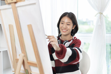 Female artist painting on canvas, Artist studio interior, Draw with watercolor, Drawing supplies ,...