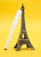Fototapeta na wymiar Eiffel Tower, Paris, France. Isolated in yellow background.
