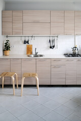 Scandinavian-style kitchen with wood-like facades