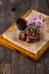 Pork shashlik with pickled onions