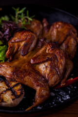 Grilled quail with salad
