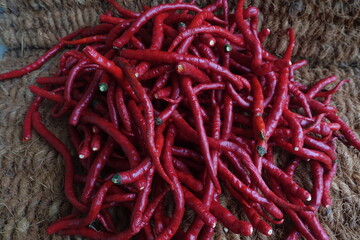 Red Chili is a fruit and plant member of the genus Capsicum