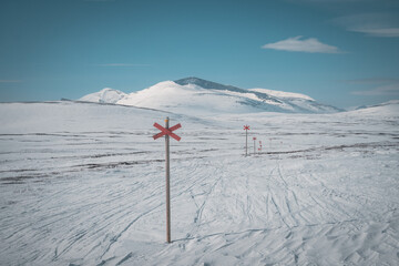 Snowy winter view of Helags mountain close to Ljungdalen (Sweden Lapland). St. Andrews Cross...
