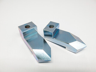 Metal, steel, stainless steel, aluminium, chrome-plated, silver-bronze, blue mixed, 2 pieces, perforated and threaded, ps, arranged parallel on a white background.