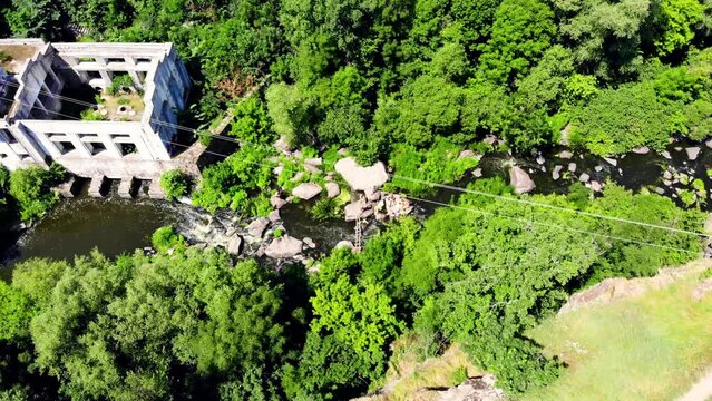 Drone shot Butsky Canyon Ukraine. Aerial view of a rocky canyon on the Gorny Tikich River near the village of Buki. River Gorny Tikich in Proterozoic granites. Ancient deep and narrow canyon 
