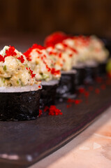 japanese dish rice rolls with cheese close-up