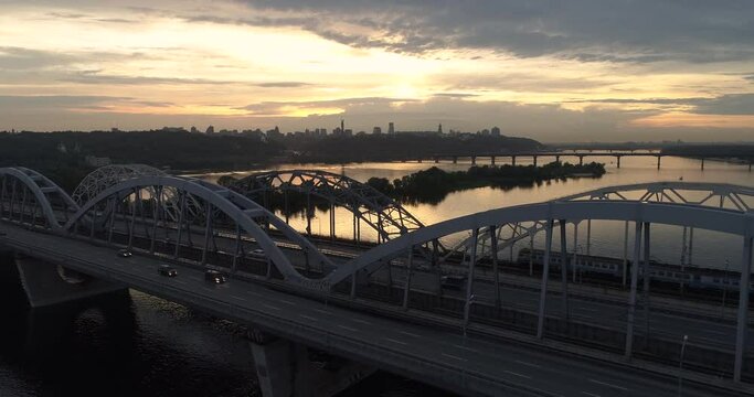 Sunset aerial view on a Darnitsky Bridge in Kyiv,Ukraine
