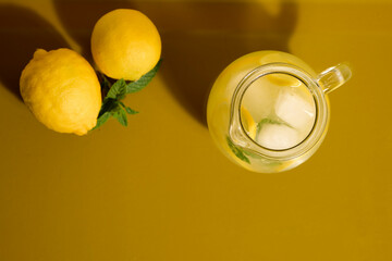 Fresh lemonade on a yellow background
