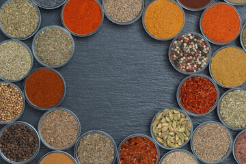 Fototapeta na wymiar Assortment of aromatic spices, seeds and dry herbs for cooking food, copy space