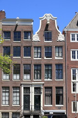 Fototapeta na wymiar Amsterdam Prinsengracht Canal Historic Brick House Facades View, Netherlands