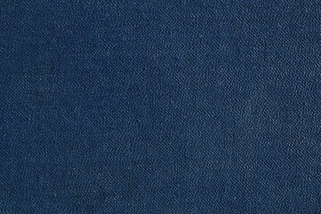 Abstract design background of glossy artificial genuine textured dark blue creased leather. Flat christmas surface. Skin natural wrinkled scratched wallpaper pattern. Close-up, mock up, top view