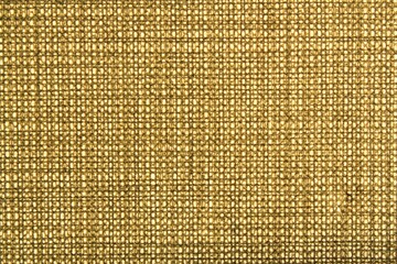 Abstract design background of lattice cell beige sand tan coarse-grained intersection texture of rough fabric with an interlacing. Linen sack textile canvas burlap cloth. Close-up, mock up, top view