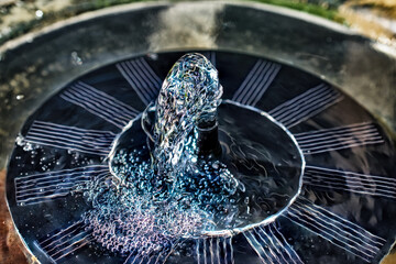 The water coming out of this solar water fountain almost looks like glass.  Floating fountain in...