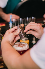 Preparation of special drink being produced in a bar