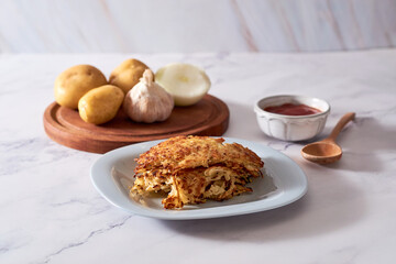 Potato Pancakes. Vegetable fritters. Latkes