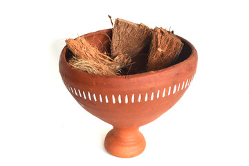 Beautiful decoratibe dhunuchi with coconut husk isolated on white background.