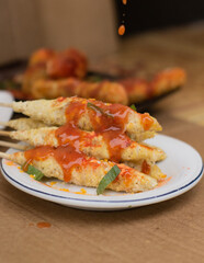 Egg Rolls, Indonesian street food, a combination of beaten egg and rolled noodles. selective focus concept