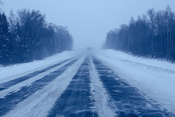 winter highway snowfall background fog poor visibility