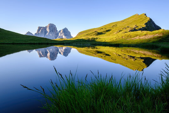 Monte Pelmo reflected on calm Lago delle Baste. Mondeval, Dolomites in Italy