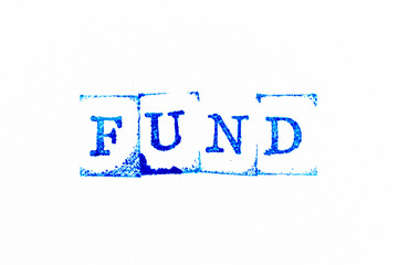 Blue color ink rubber stamp in word fund on white paper background