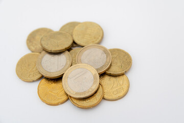 Euro coins lying on a white background