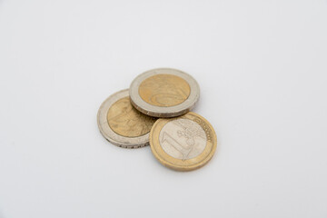 Euro coins lying on a white background